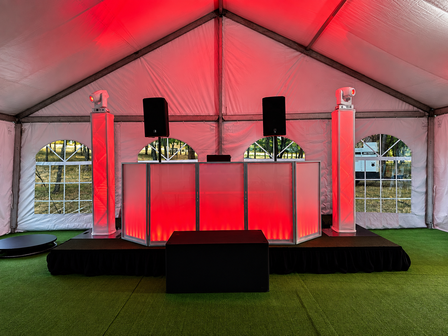 A DFW Sound event setup with speakers, moving lights, and uplighting
